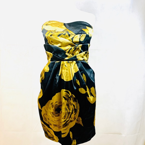 Dots Dresses & Skirts - Strapless Gold & Black Dress